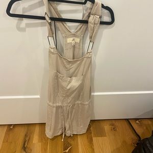 Nude overalls, adjustable straps, cargo material